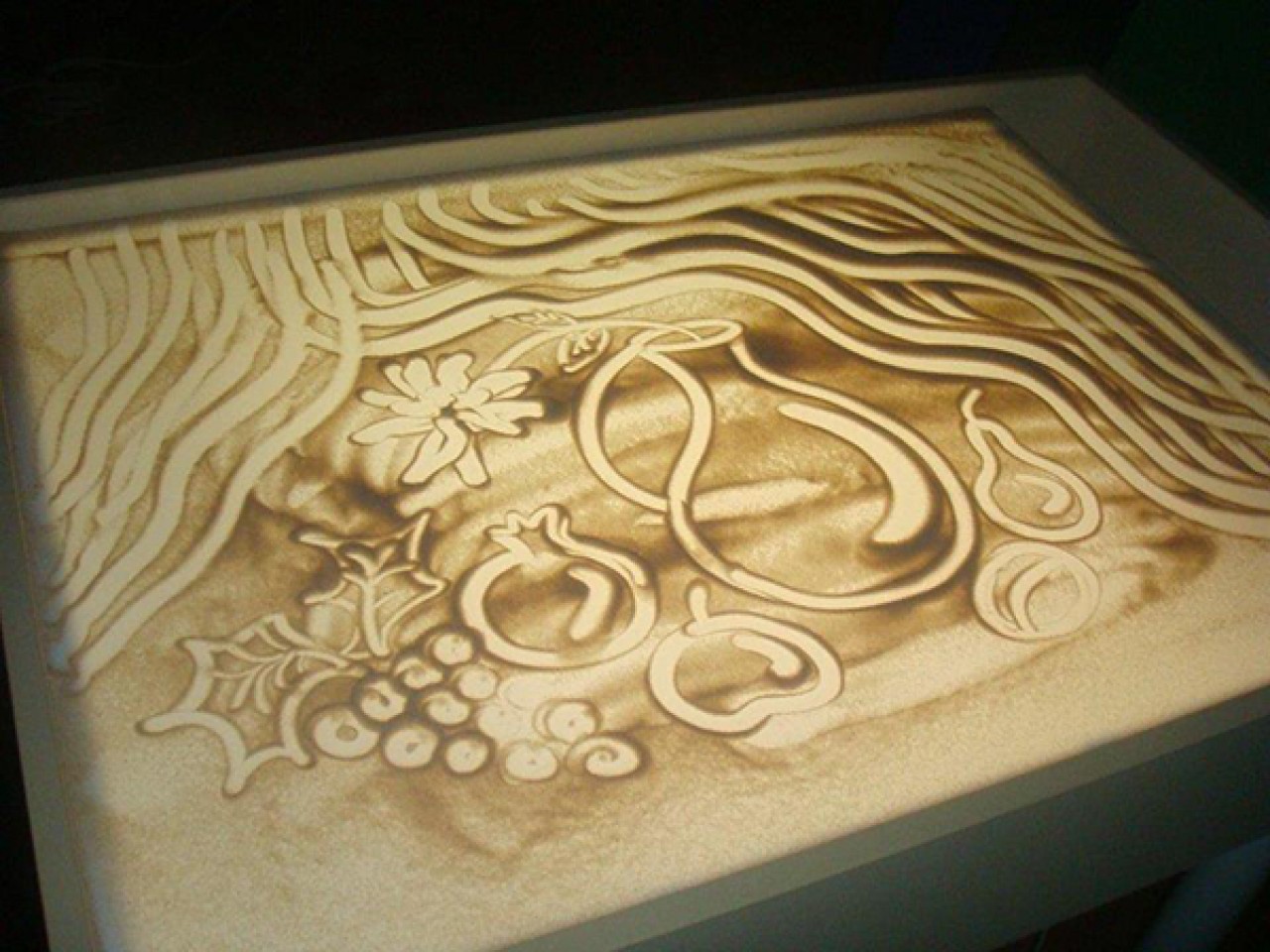 Рисование песком на световых столах